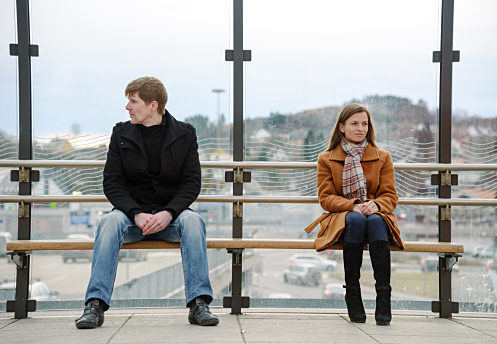 Friends at the bus stop on a Wednesday